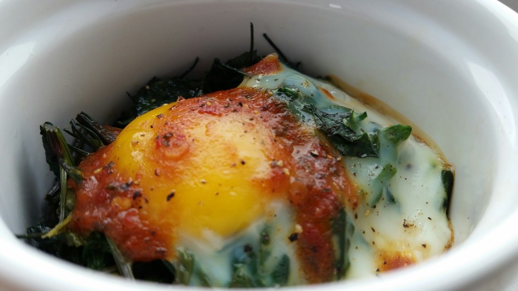 Baked Eggs with Lambsquarters and Harissa